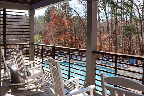 The Crest at Berkeley Lake view of pool from clubhouse backdeck located in Duluth, GA